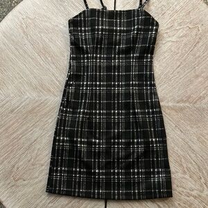 This RSQ dress was never worn, straps are adjustable.